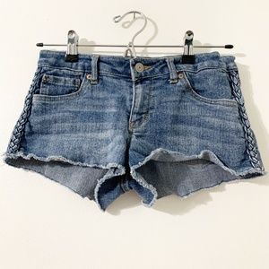 Levi Levi’s Strauss Denim Jean Shorty Short Cut-Off Braided Trim Along Side 🟦